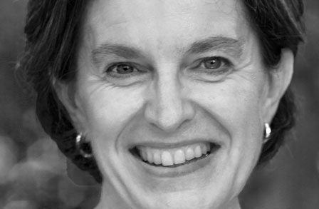 Black and white headshot of poet Claudia Emerson.